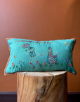 Blue pillow with embroidery