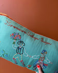 Blue pillow with embroidery